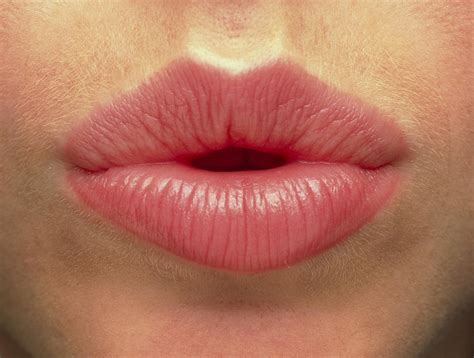 Close-up Of The Pink Lips Of A Woman (front View ...