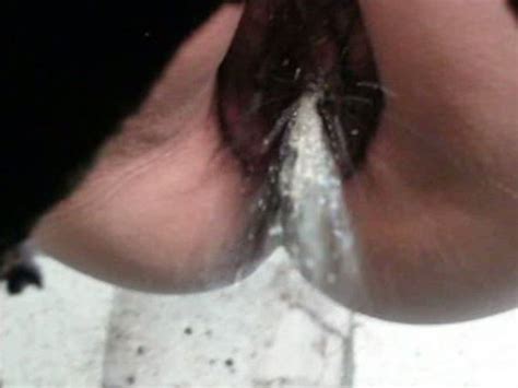 Close up of pussy pissing over the toilet | voyeurstyle.com