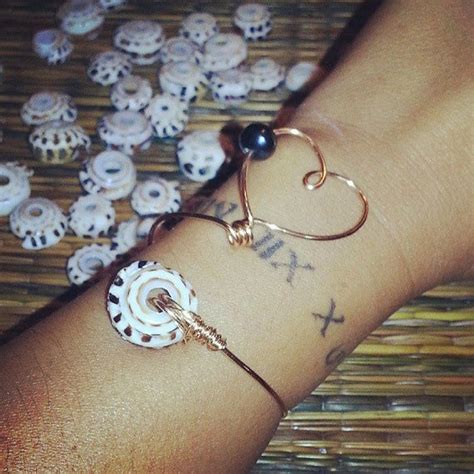 Items similar to Beeg Puka Gold Heart Cuff on Etsy