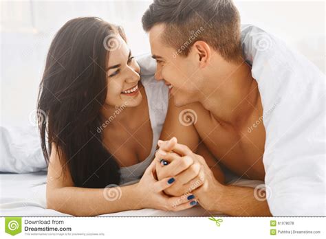 Close Up Portrait Of Romantic Couple In Bed Stock Photo ...