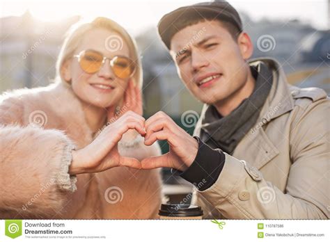 Enamored Couple Is Making Love Gesture Stock Photo - Image ...
