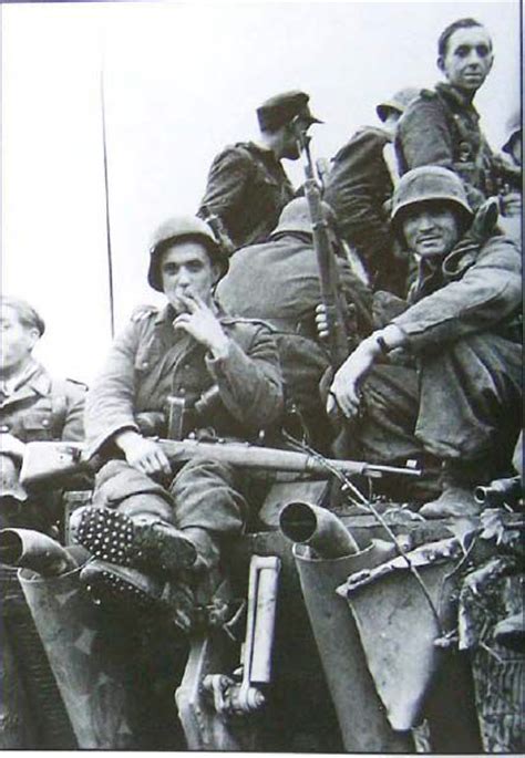 Close up of German Panzergrenadiers on the engine deck ...