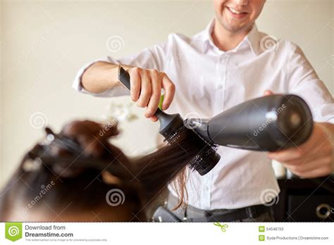 Close Up Of Stylist Making Hairdo At Salon Stock Photo ...