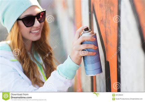 Close Up Of Woman With Spray Paint Making Graffiti Stock ...
