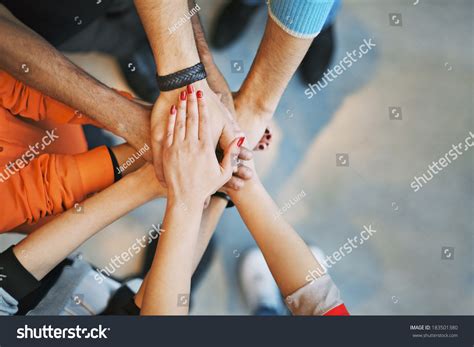 Multiethnic Group Of Young People Putting Their Hands On ...