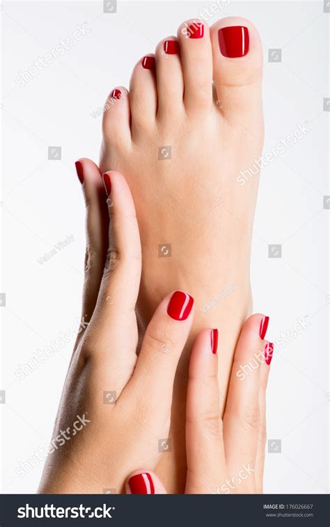 Closeup Photo Of A Female Feet With Beautiful Red Pedicure ...